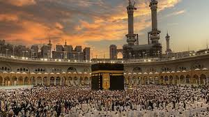 First-time Australian Muslim pilgrims performing Umrah rituals near the Kaaba in Masjid al-Haram, Makkah